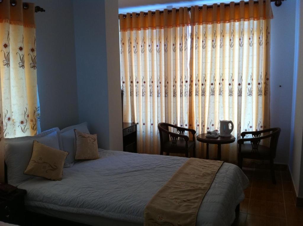 Minh Quan Otel Bao Loc Oda fotoğraf
